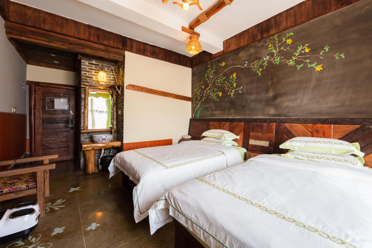 Butterfly Flowers Inn- Exclusive Location,Anicent Chinese Style, 2 minutes walk to Tianmen Mount Cableway,Free pick up service over 1 nights, Free fresh coffee and tea, Free mini lunch,Free laundry,Itineary planning, Attraction Tickets Serivce in advance photo 4