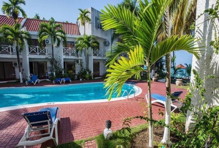 Foto - Idyllic Beachfront Condo