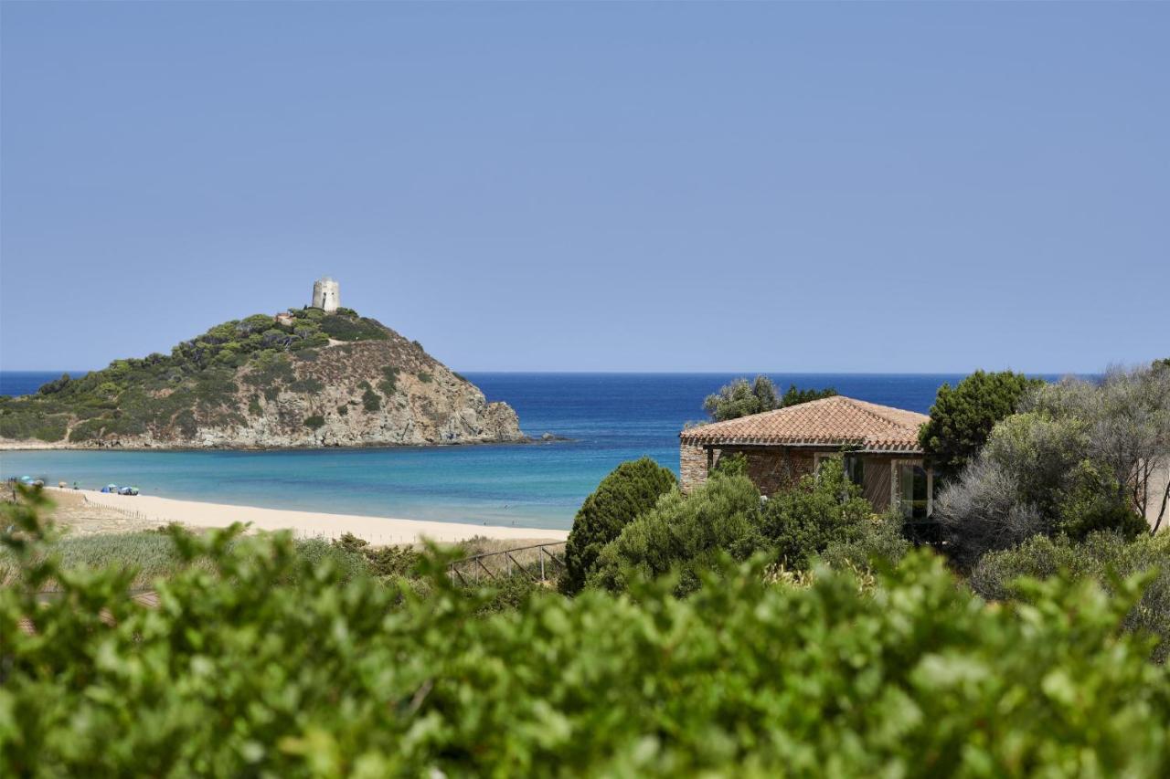 Baia Chia Laguna Resort, Curio Collection by Hilton