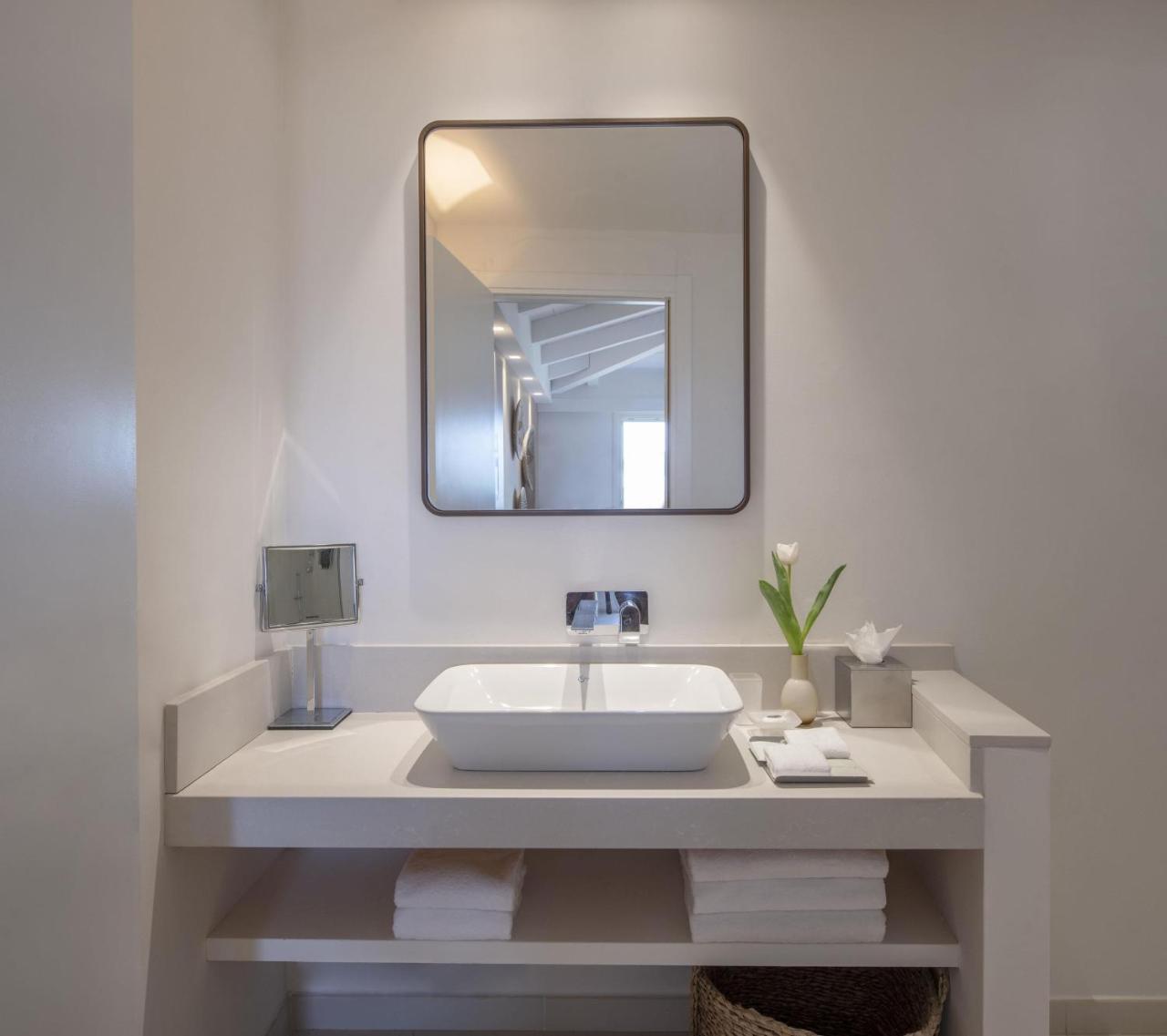Baia Chia Laguna Resort, Curio Collection by Hilton photo 2