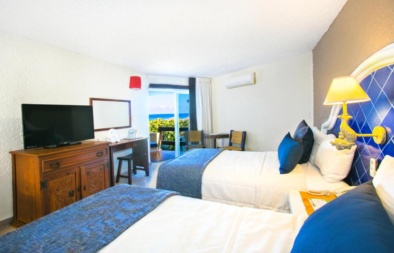 Casa del Mar Cozumel Hotel & Dive Resort with free access to an exclusive beach club photo 3
