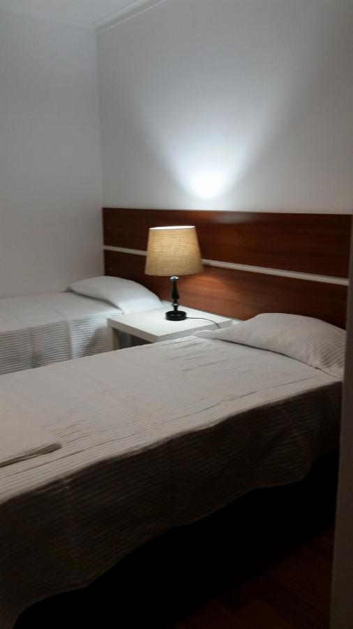 Tweepersoonskamer met Gedeelde Badkamer
