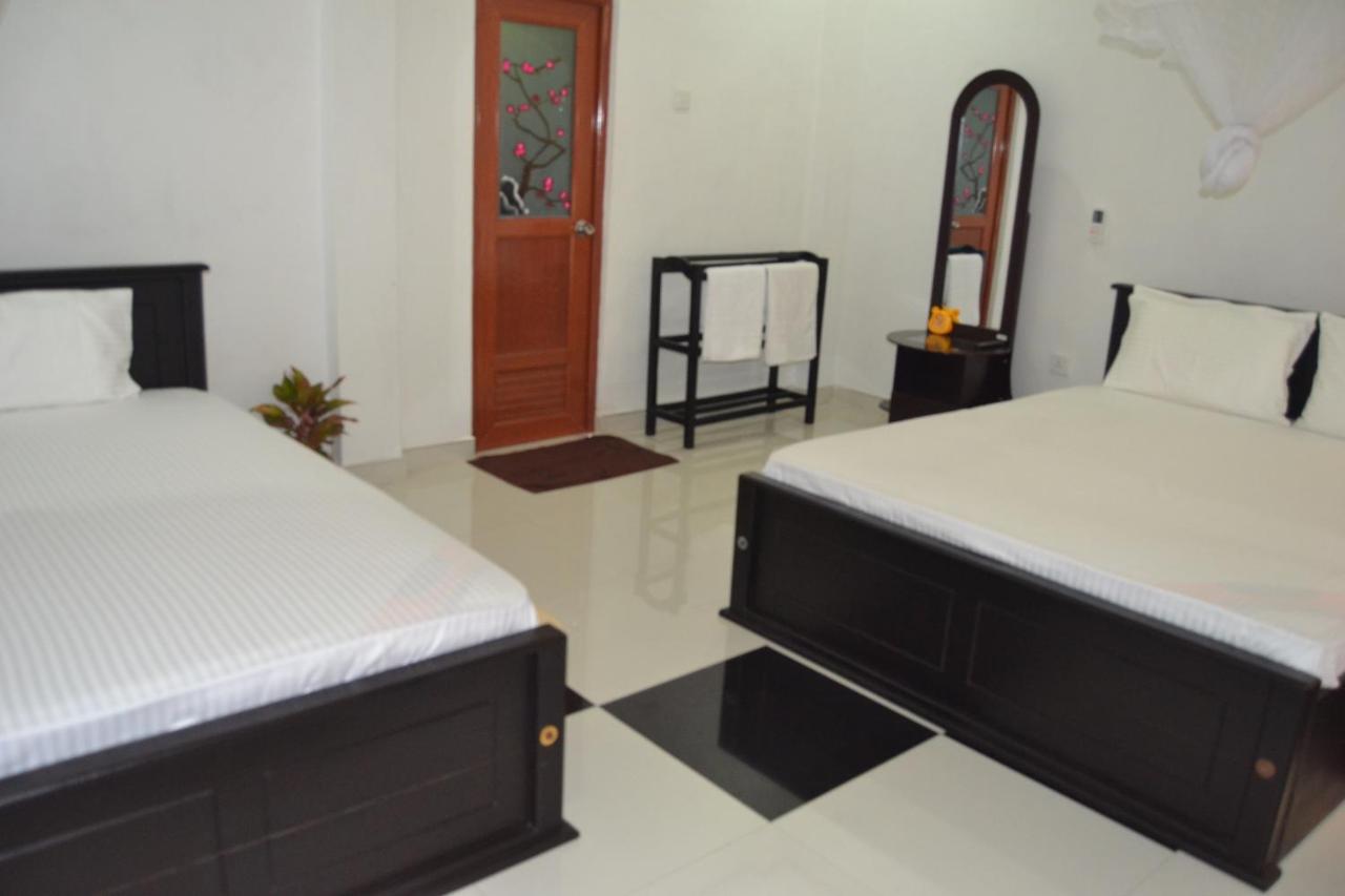 Habitación Triple con vistas al jardín