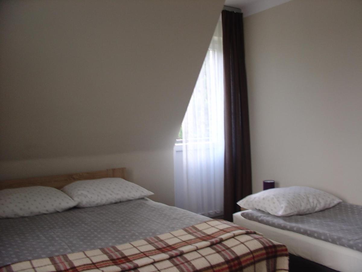 Dreibettzimmer mit Balkon