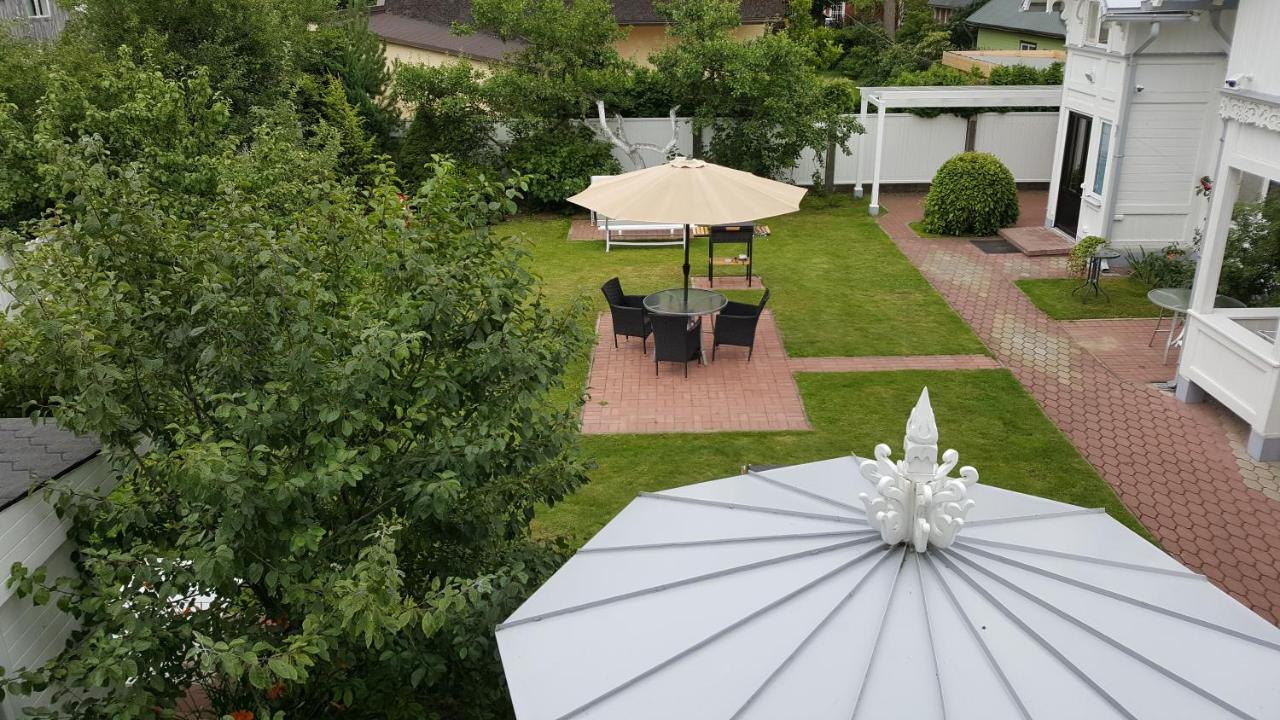 Camera Tripla con Balcone e Cucina in Comune