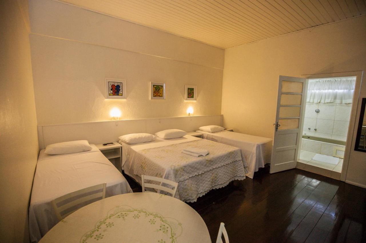 Quarto Família 1 cama de casal e 2 de solteiro