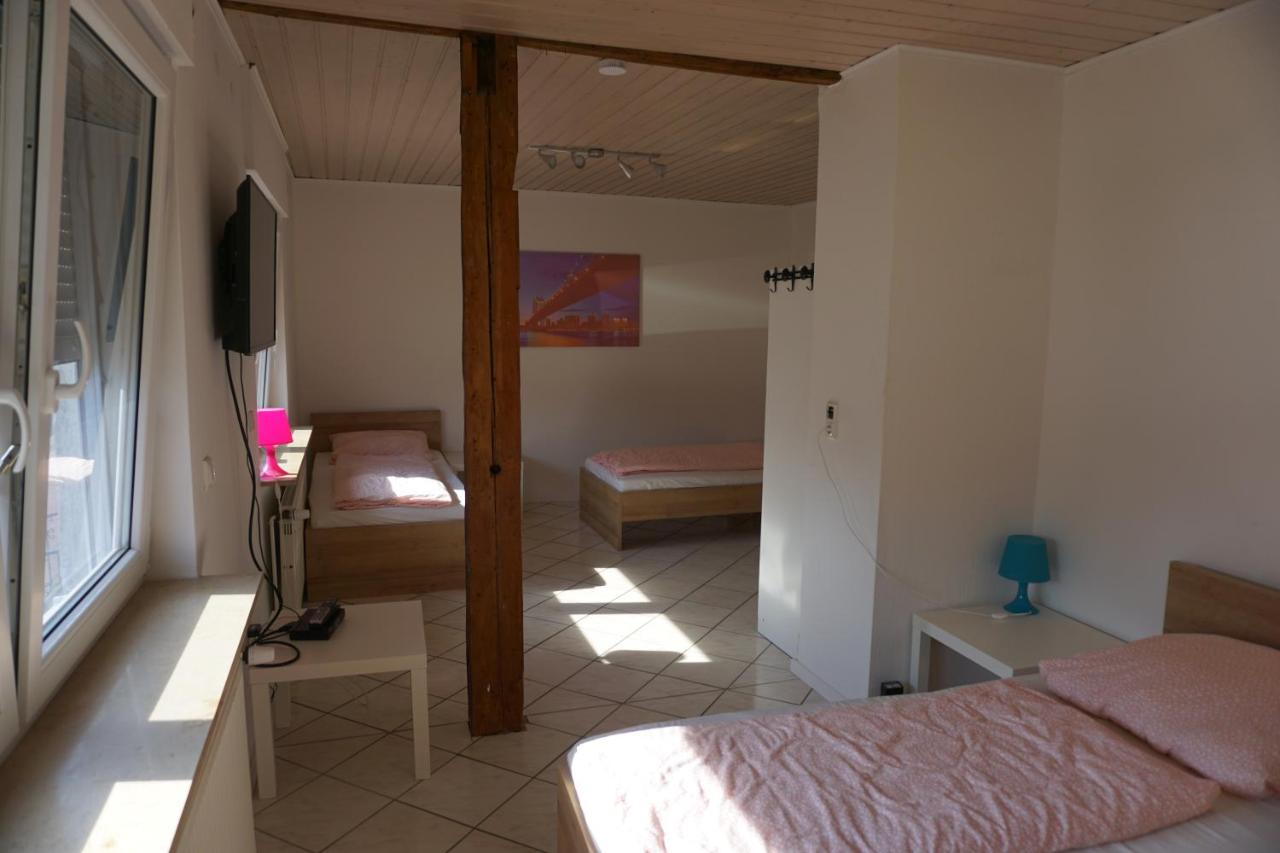 Chambre Quadruple avec Salle de Bains Commune