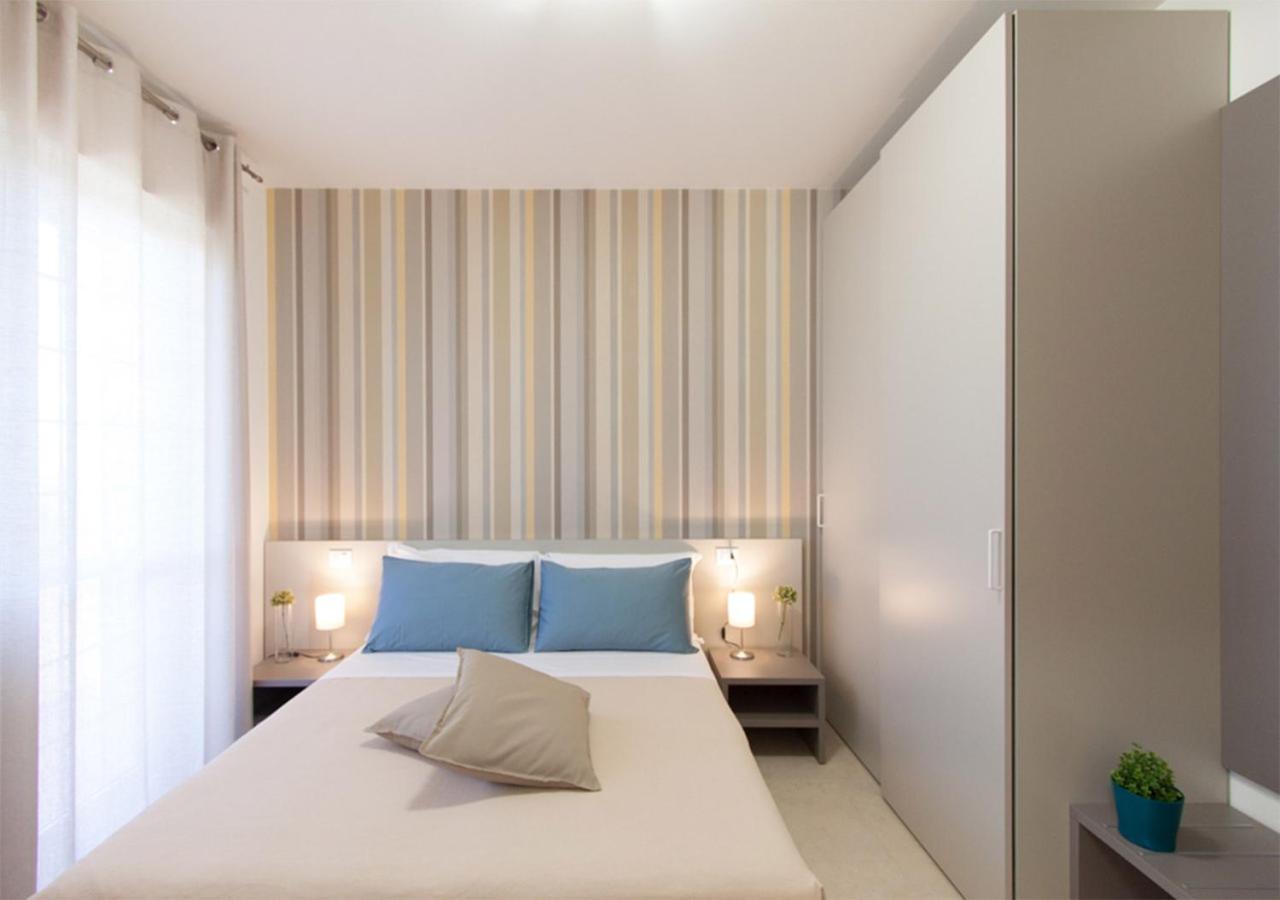 Standaard Tweepersoonskamer met 1 of 2 Bedden en Balkon