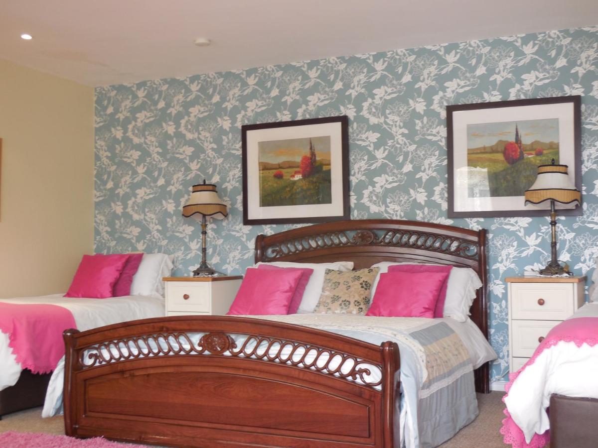 Camera Familiare con Vista Giardino