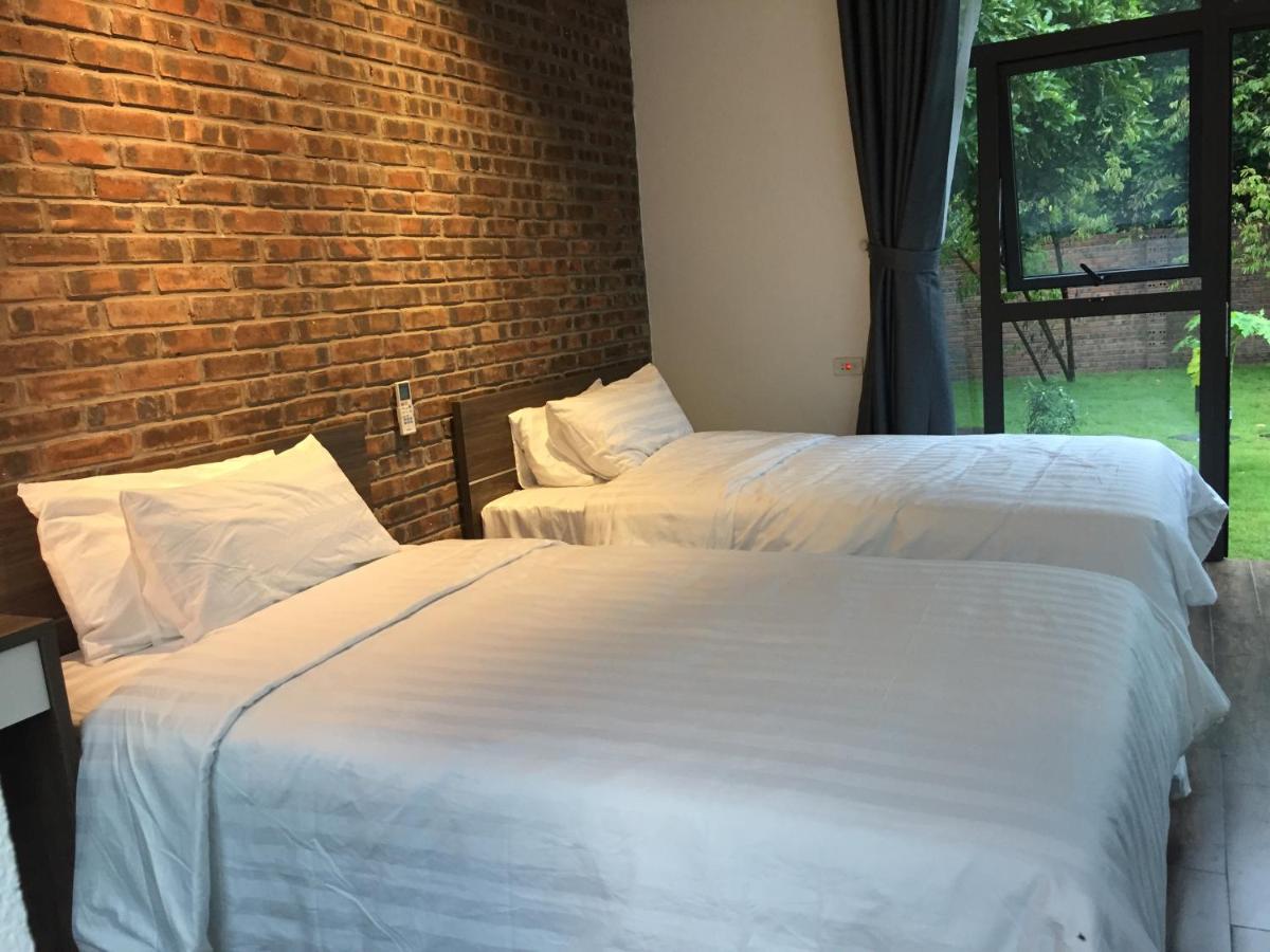 Zweibettzimmer mit Gartenblick