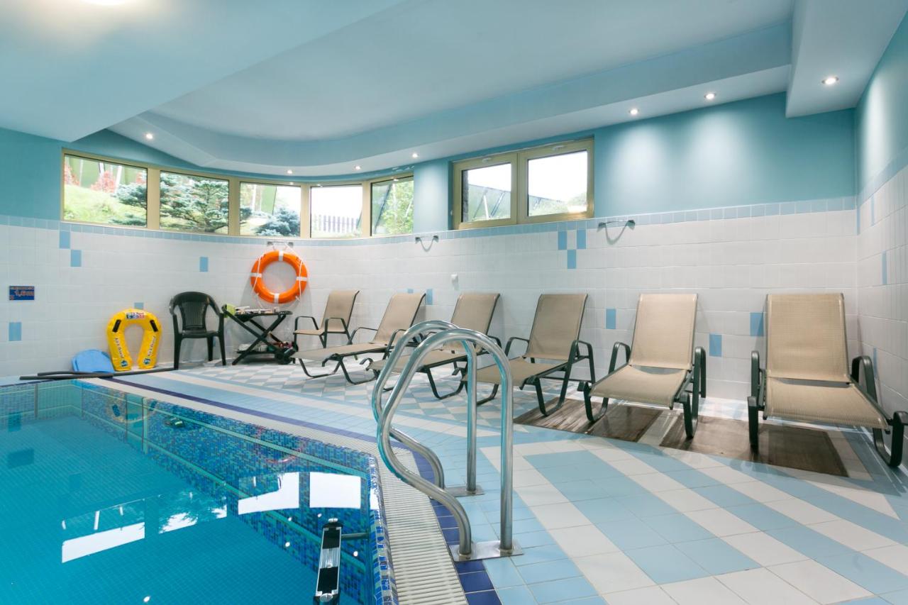 Apartament Pomarańczowy z basenem i sauną - Ferienwohnung Koscielisko