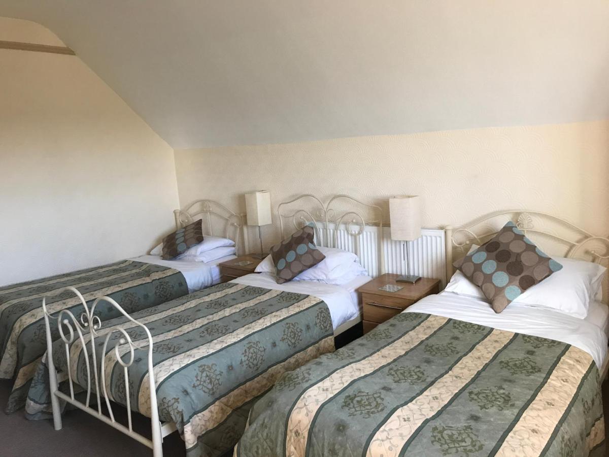 Chambre Triple avec Salle de Bains Commune