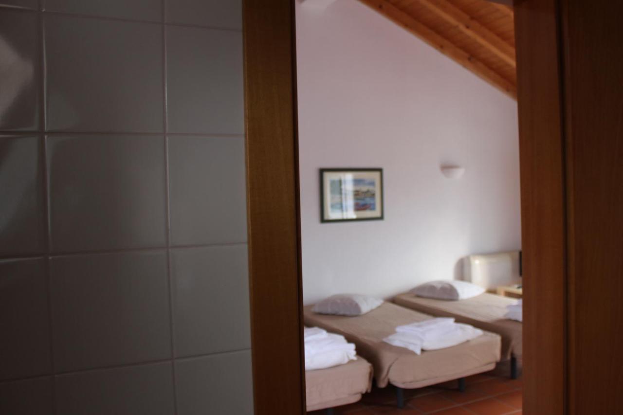 Dreibettzimmer mit Bergblick