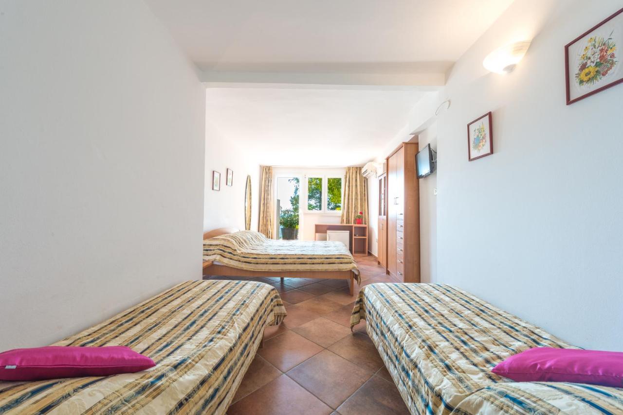 Chambre Triple avec Terrasse - Vue sur Mer