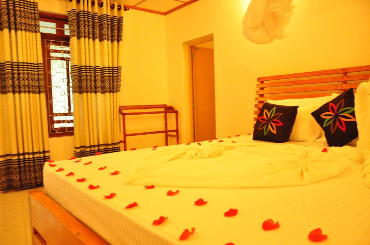 Camera Matrimoniale Deluxe (2 Adulti + 1 Bambino) 