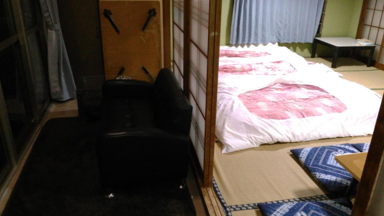 Japanese-Style Family Room with Shared Bathroom and Ocean View