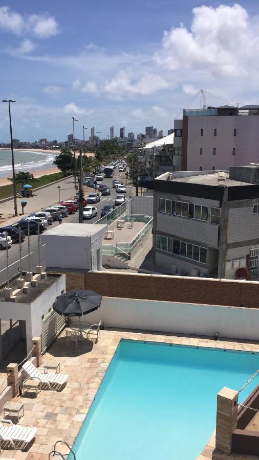 Apartamento de frente ao Mar a 50m do MAG Shopping - B&B