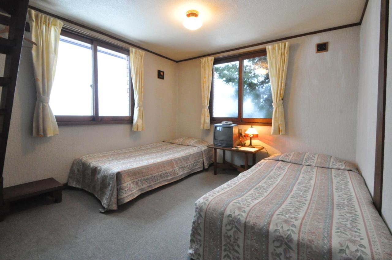 Quadruple Room with Shared Bathroom