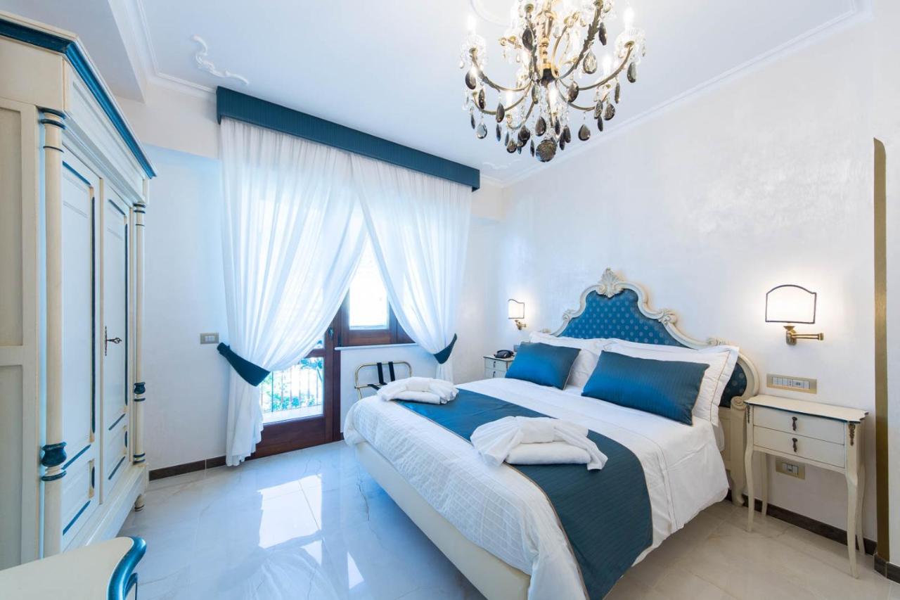 Camera Tripla con Balcone e Vista Mare 