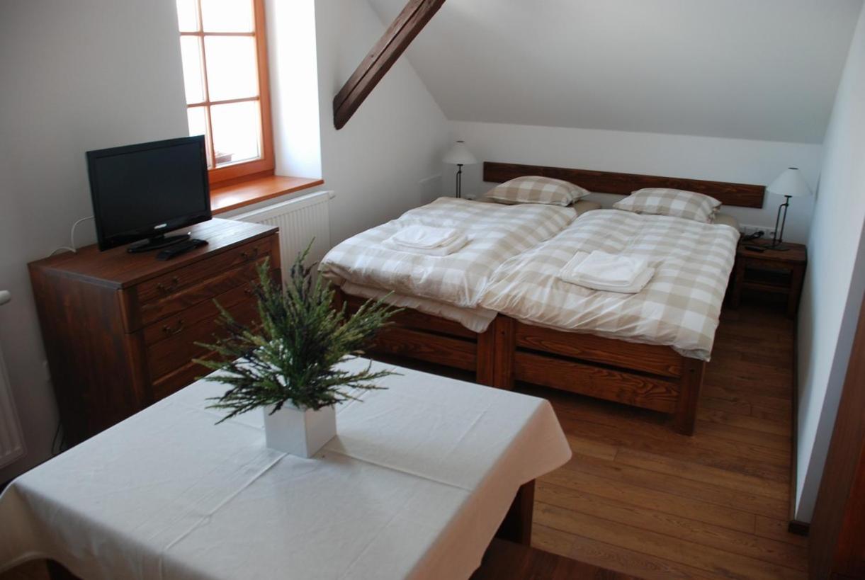 Chambre Quadruple avec Cuisine Commune