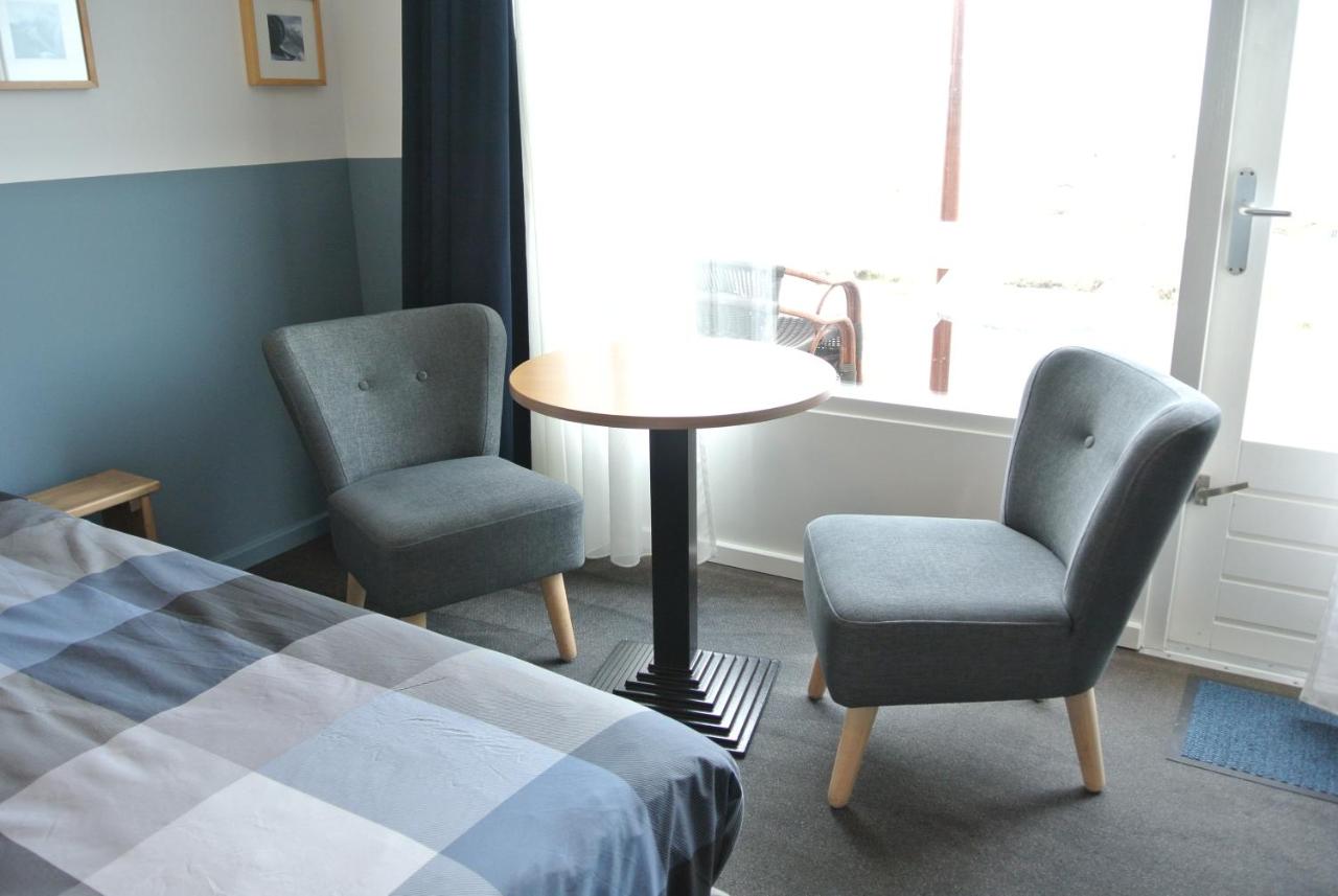 Doppelzimmer mit Balkon und Meerblick