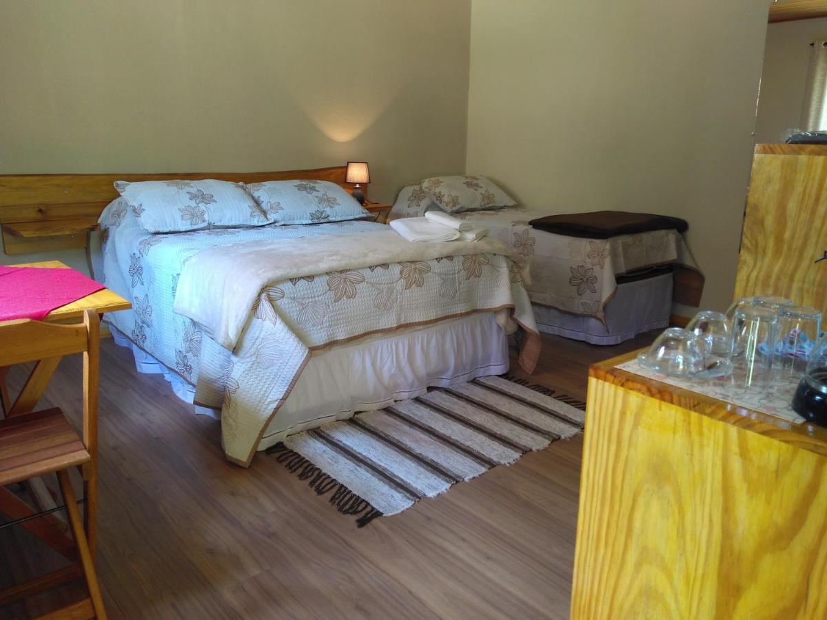 Camera Tripla con Vista Giardino