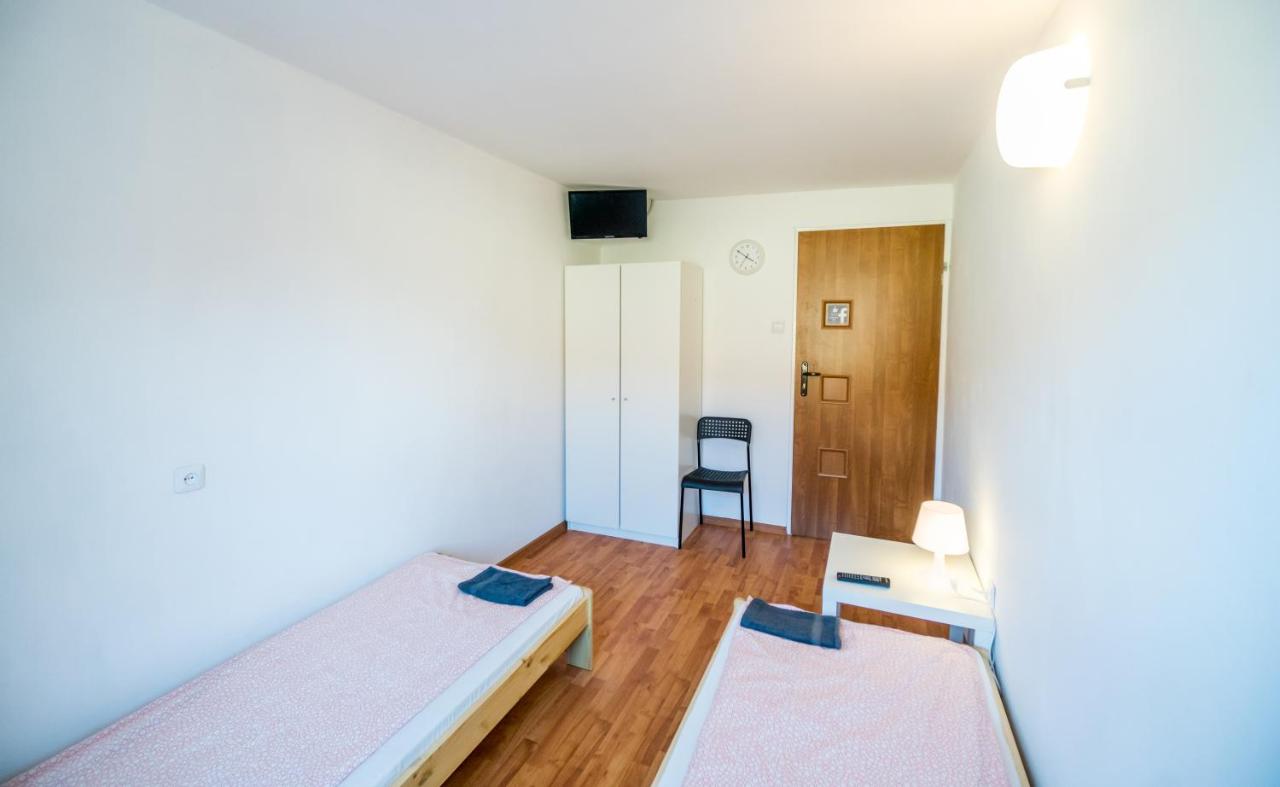 Small Twin Room with Shared Toilet