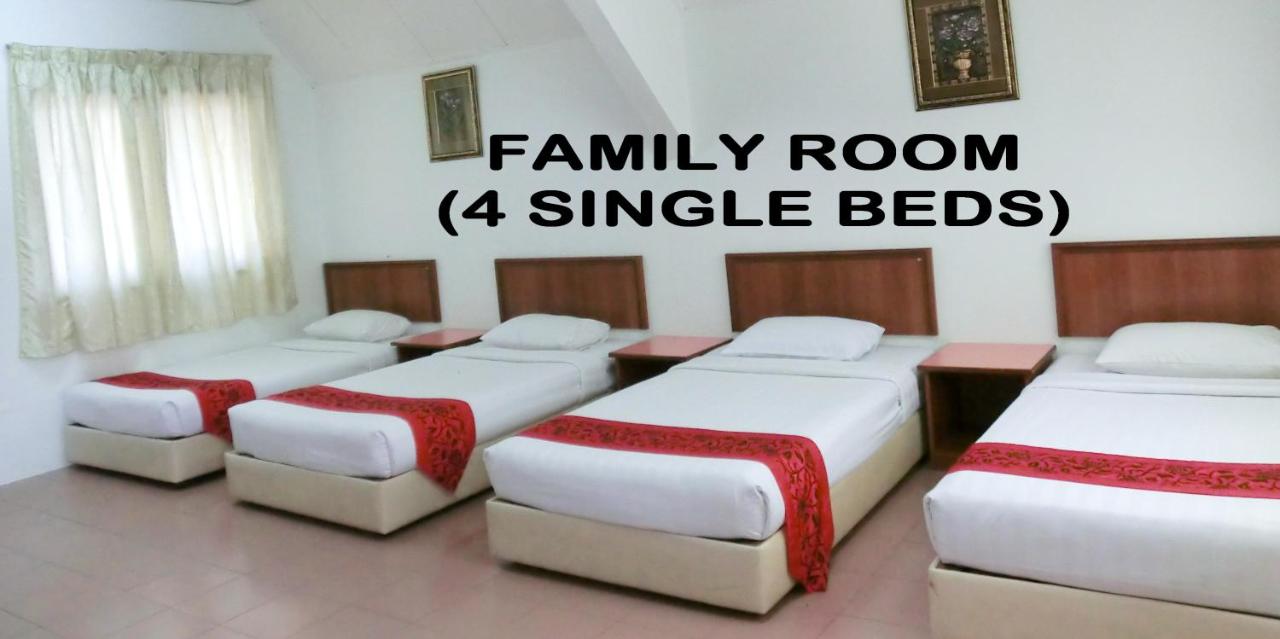 Familiekamer - 4 Eenpersoonsbedden