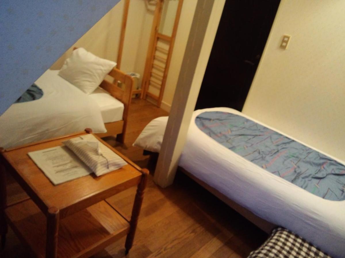 Twin Room with Shared Bathroom