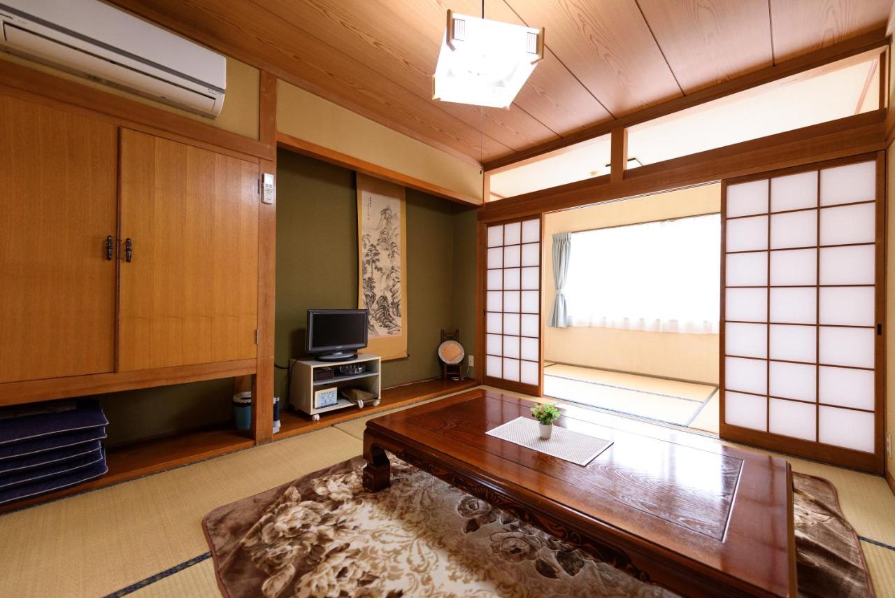 Japanese-Style Family Room with Shared Bathroom