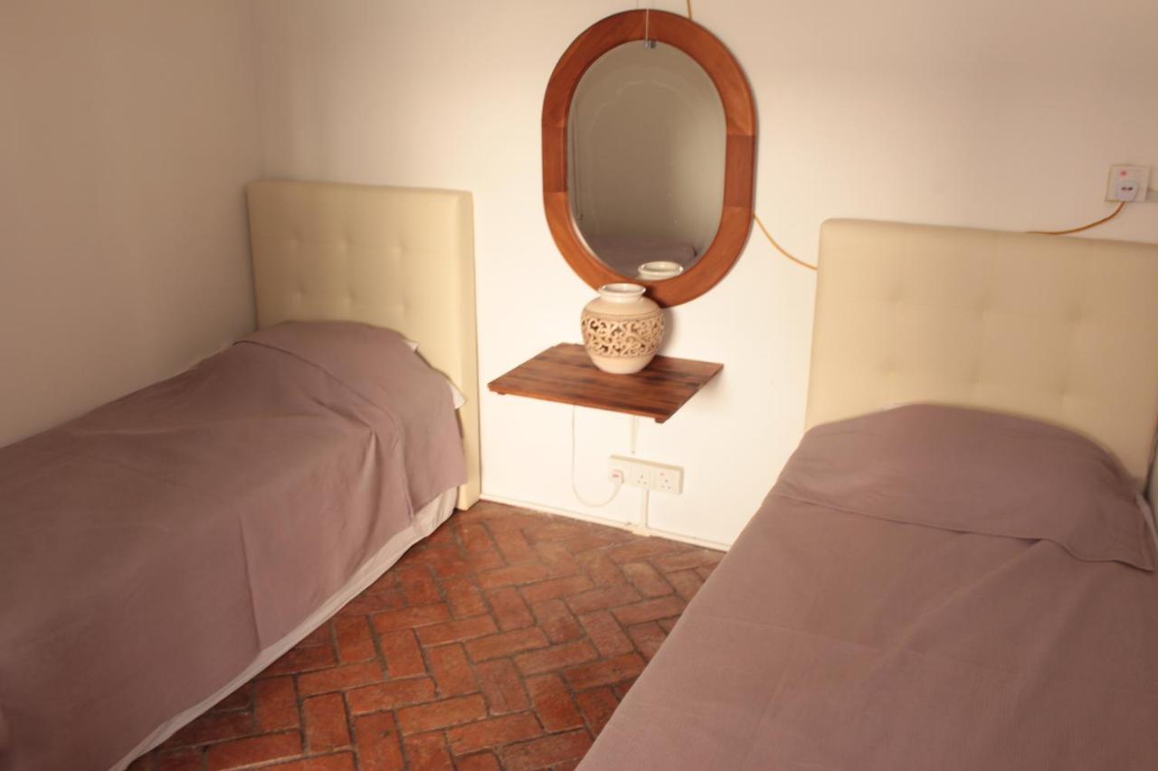 Camera Standard Doppia con Letti Singoli con Bagno in Comune