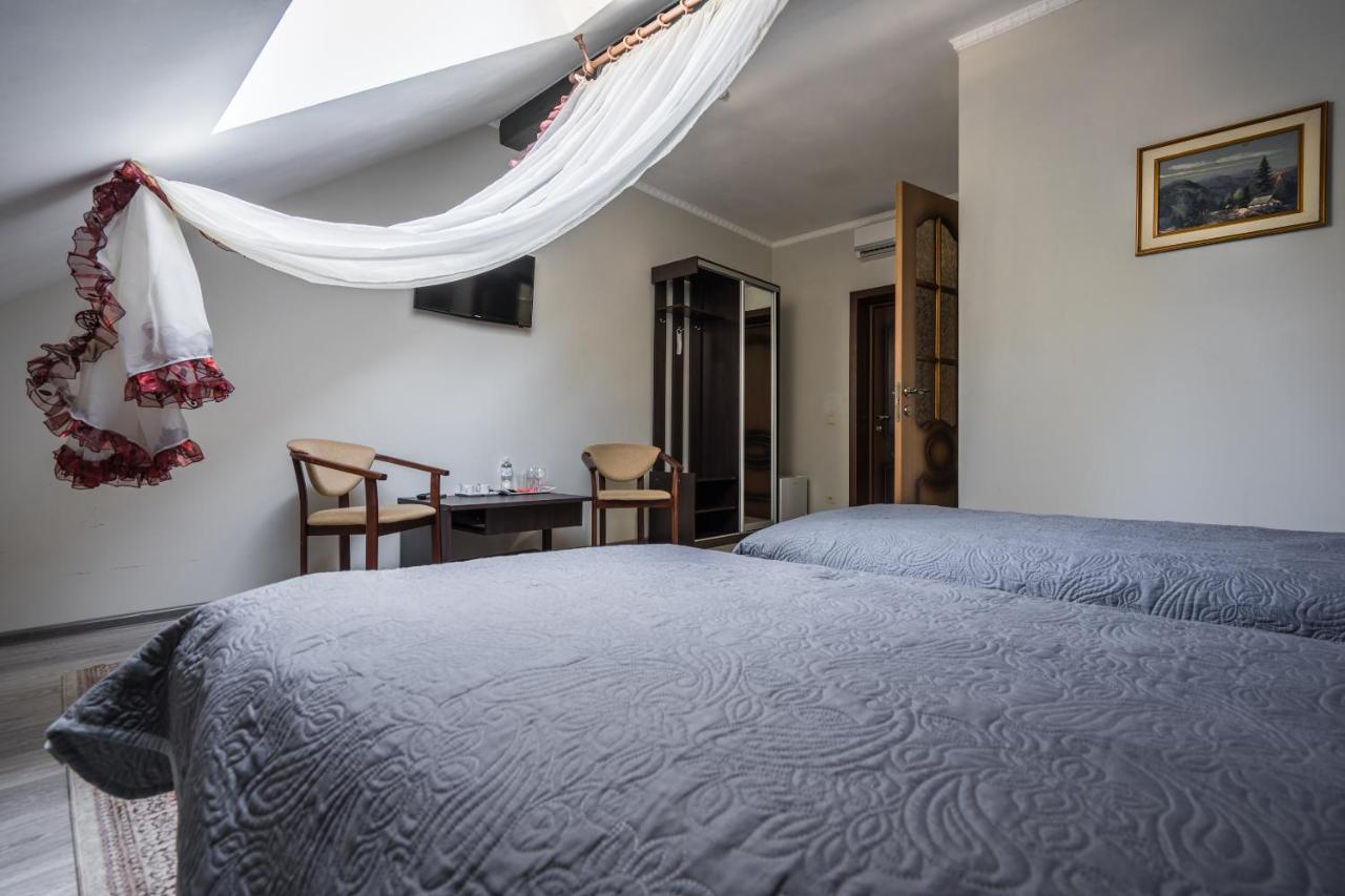 Tweepersoonskamer met 2 Aparte Bedden