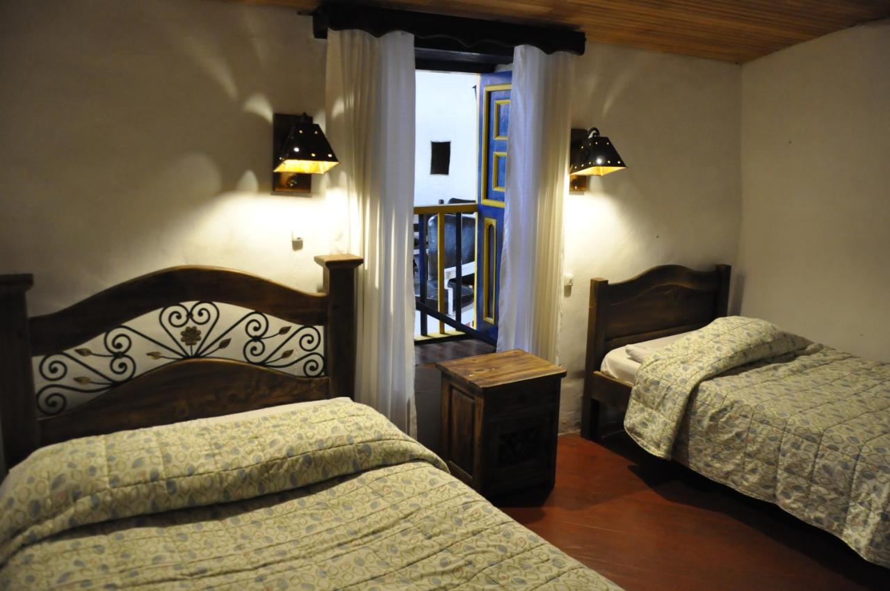 Tweepersoonskamer met 2 Aparte Bedden
