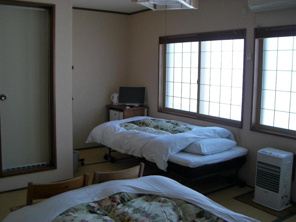 Camera Tripla con Area Tatami