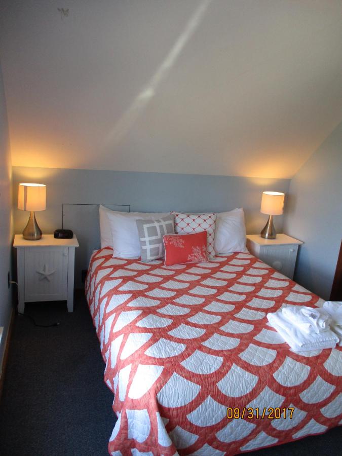 Zimmer mit Queensize-Bett und Meerblick