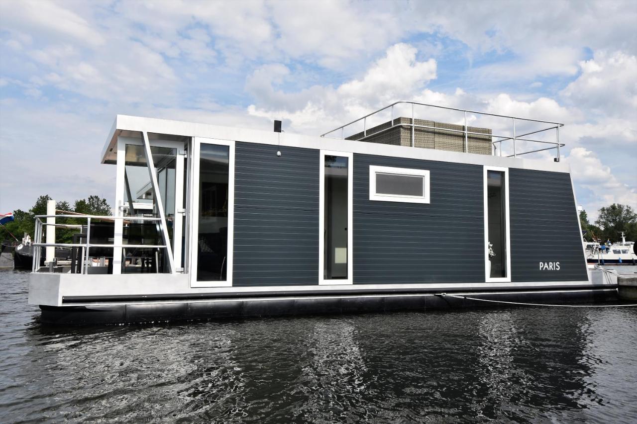 Cosy floating boatlodge, "Paris" - Ferienwohnung Maastricht
