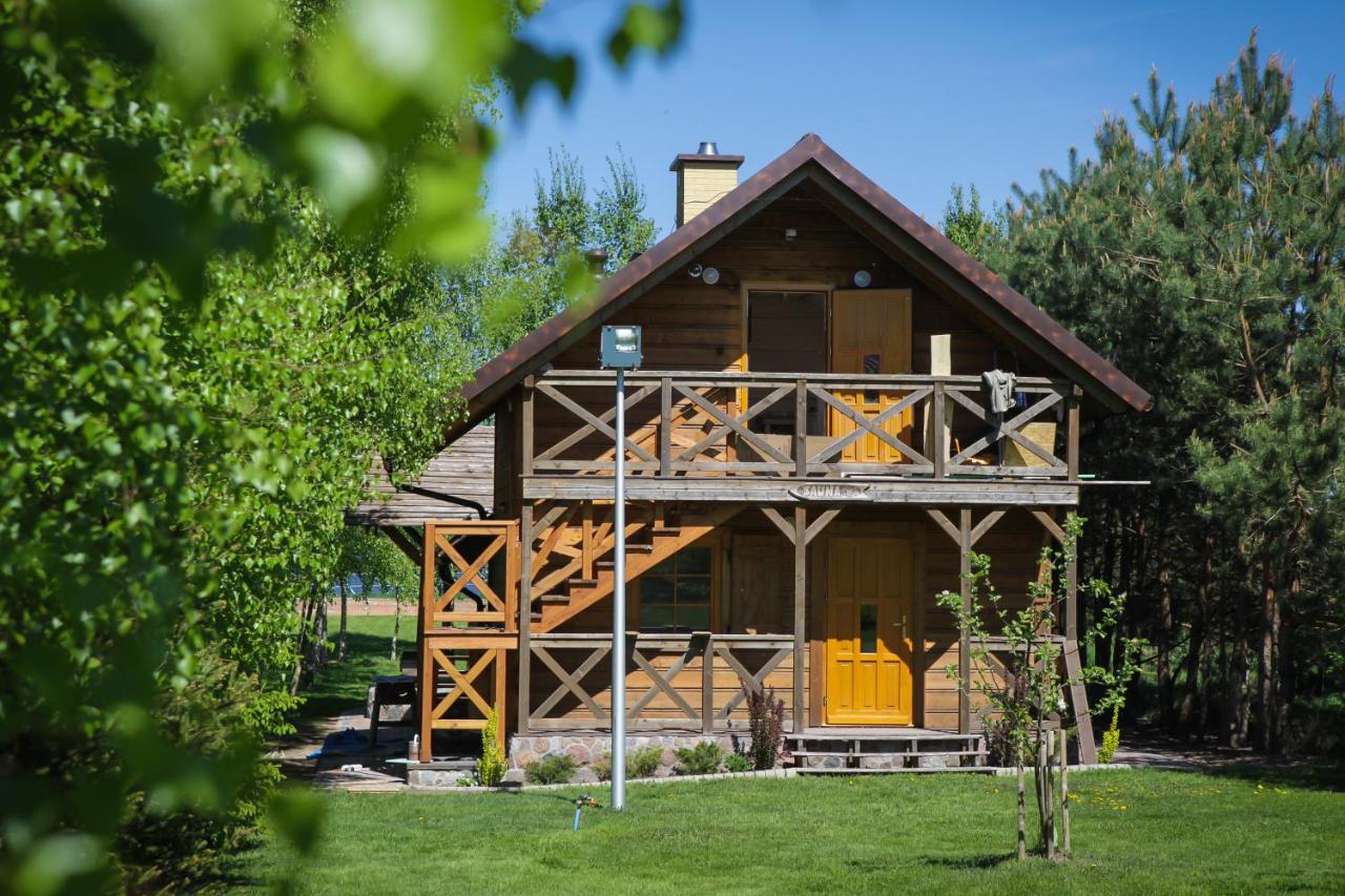 Apartamenty Osowa nad jeziorem Okmin - Chambres d’hôtes