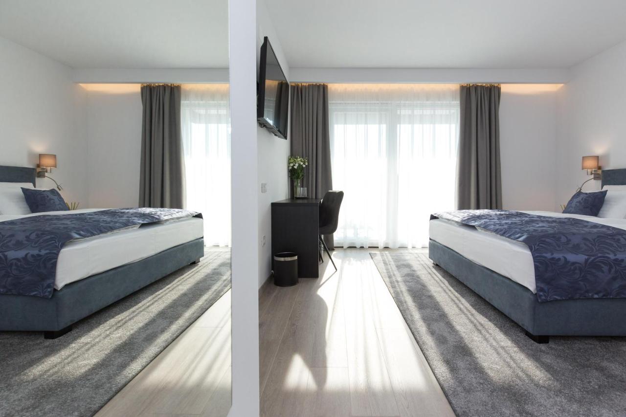 Deluxe Doppelzimmer mit Balkon und Stadtblick