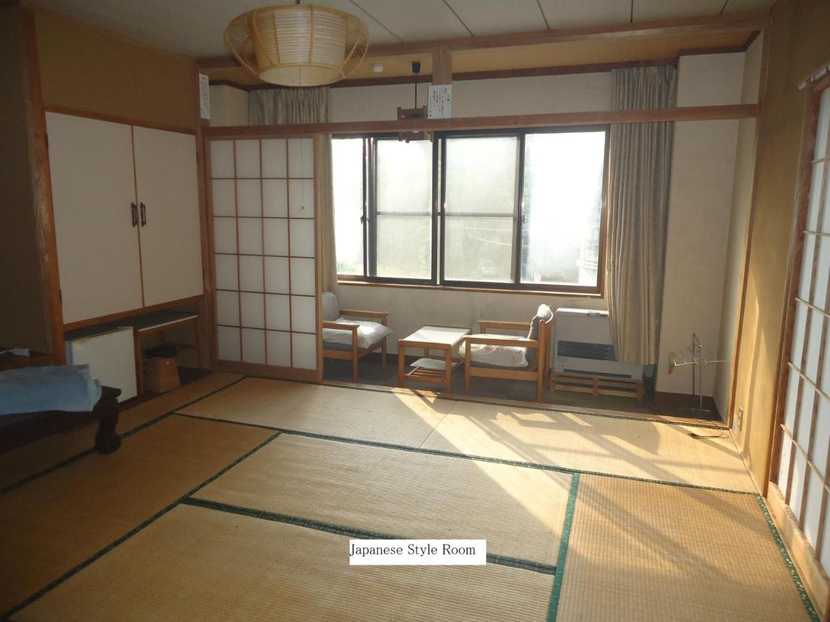 Chambre Quadruple avec Salle de Bains Commune