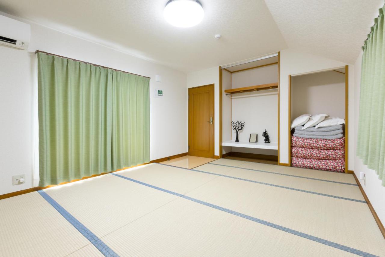 Quadruple Room with Shared Bathroom