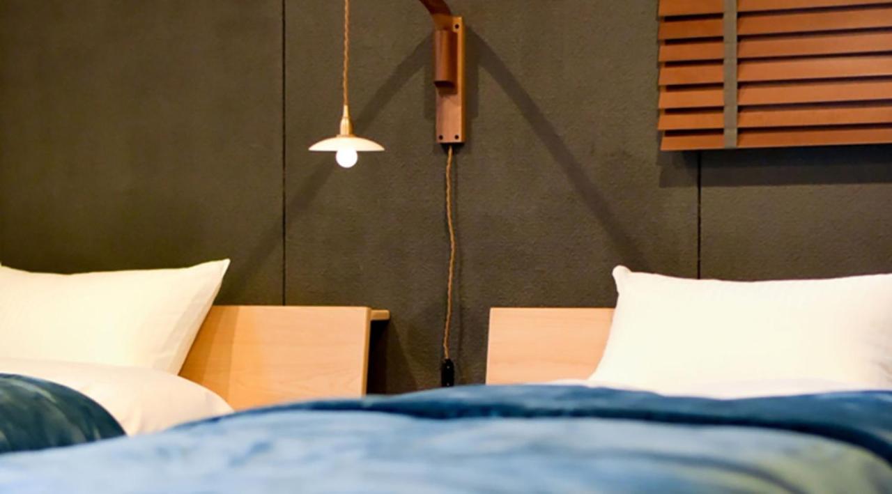 Camera Doppia con Letti Singoli con Letto Supplementare