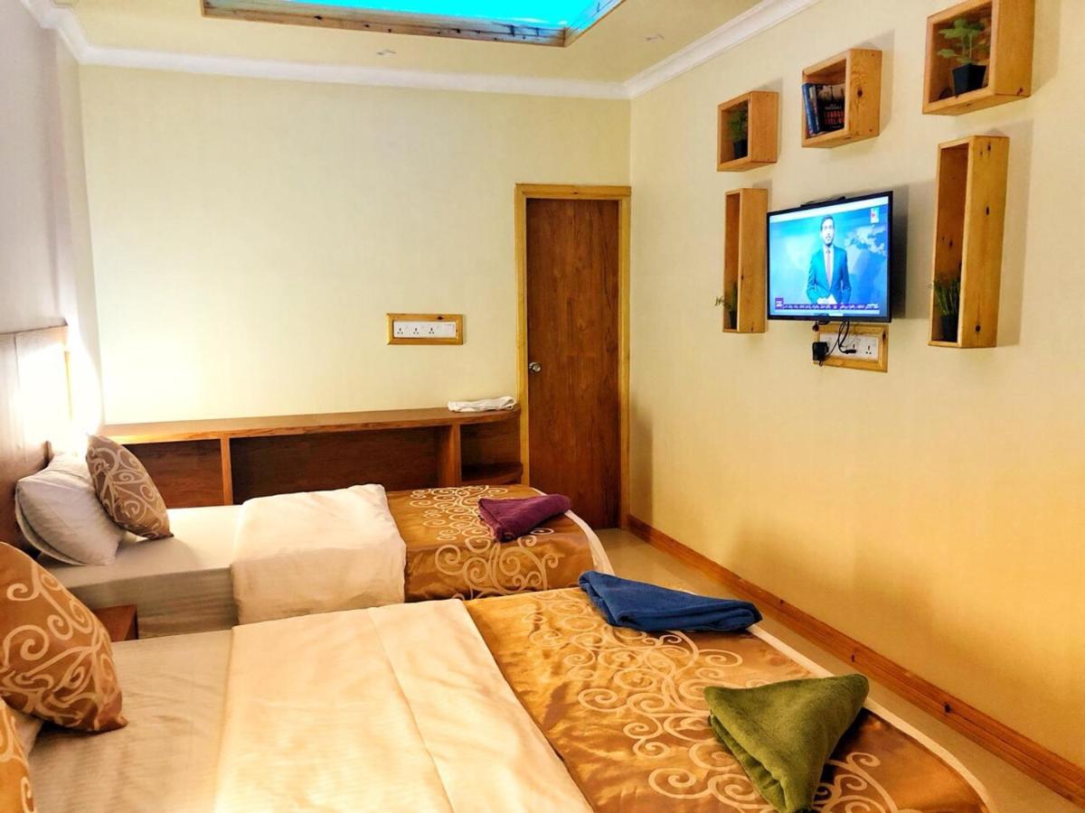 Deluxe Triple Room