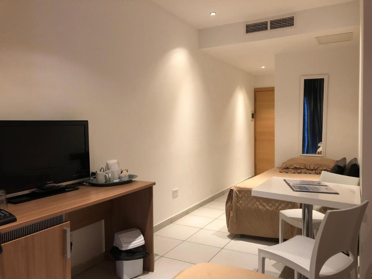 Familiekamer (2 Volwassenen + 2 Kinderen) met Gratis Vervoer van/naar de Luchthaven