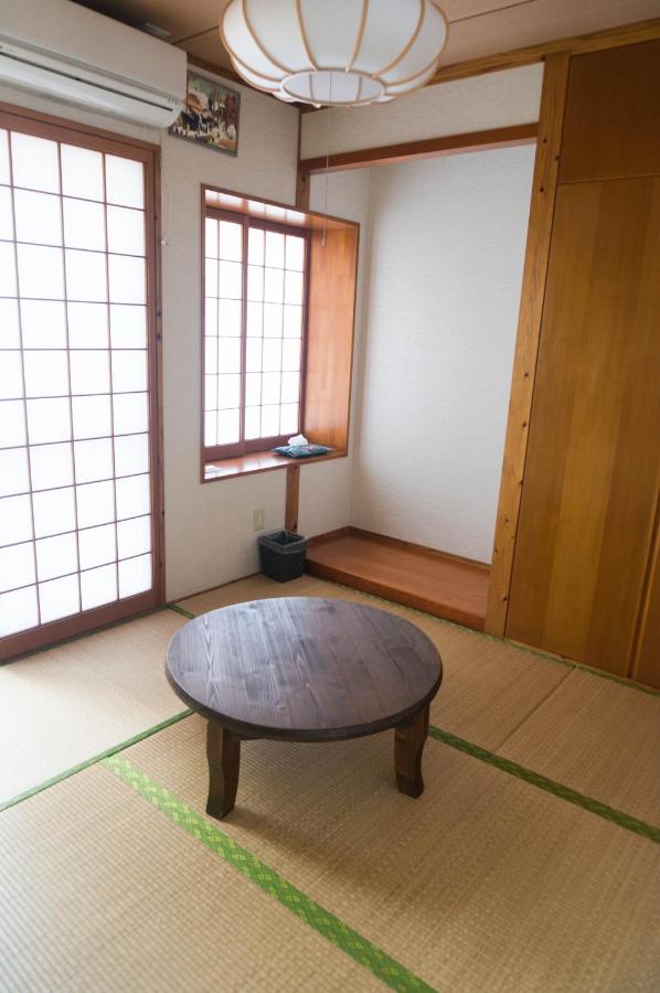Camera in Stile Giapponese con Bagno in Comune
