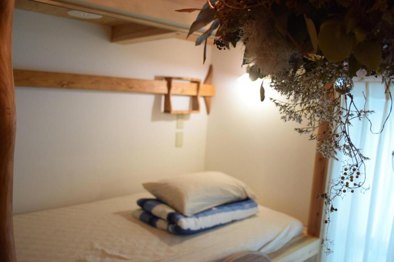 Chambre Quadruple Économique avec Salle de Bains Commune