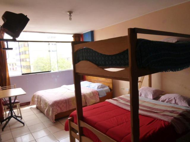 Quadruple Room with Private Bathroom