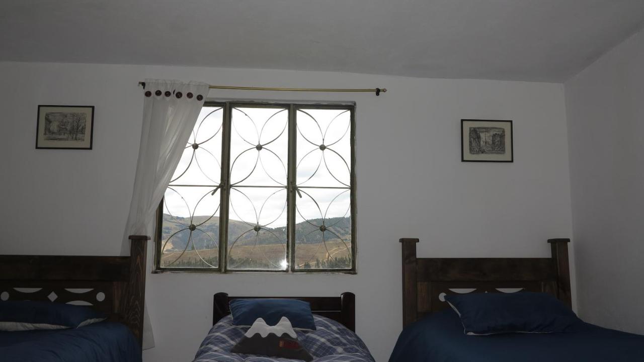 Cama individual en habitación compartida