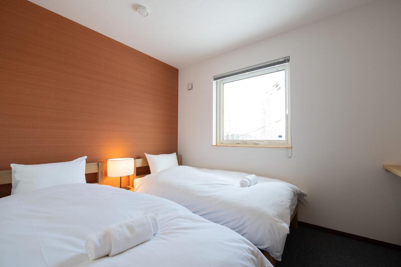Tweepersoonskamer met 2 Aparte Bedden