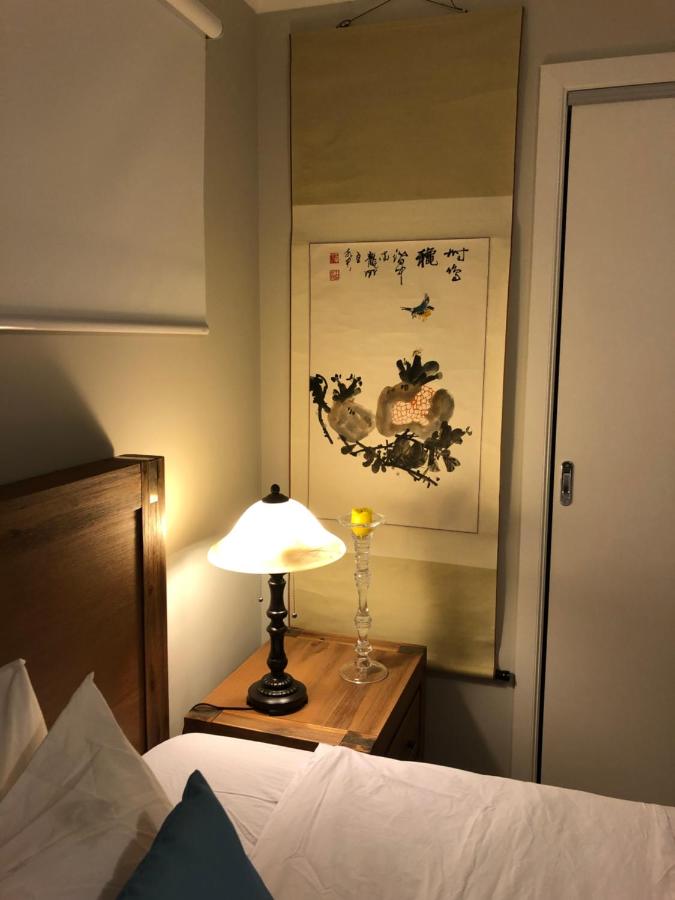 Queen Room with Shared Bathroom