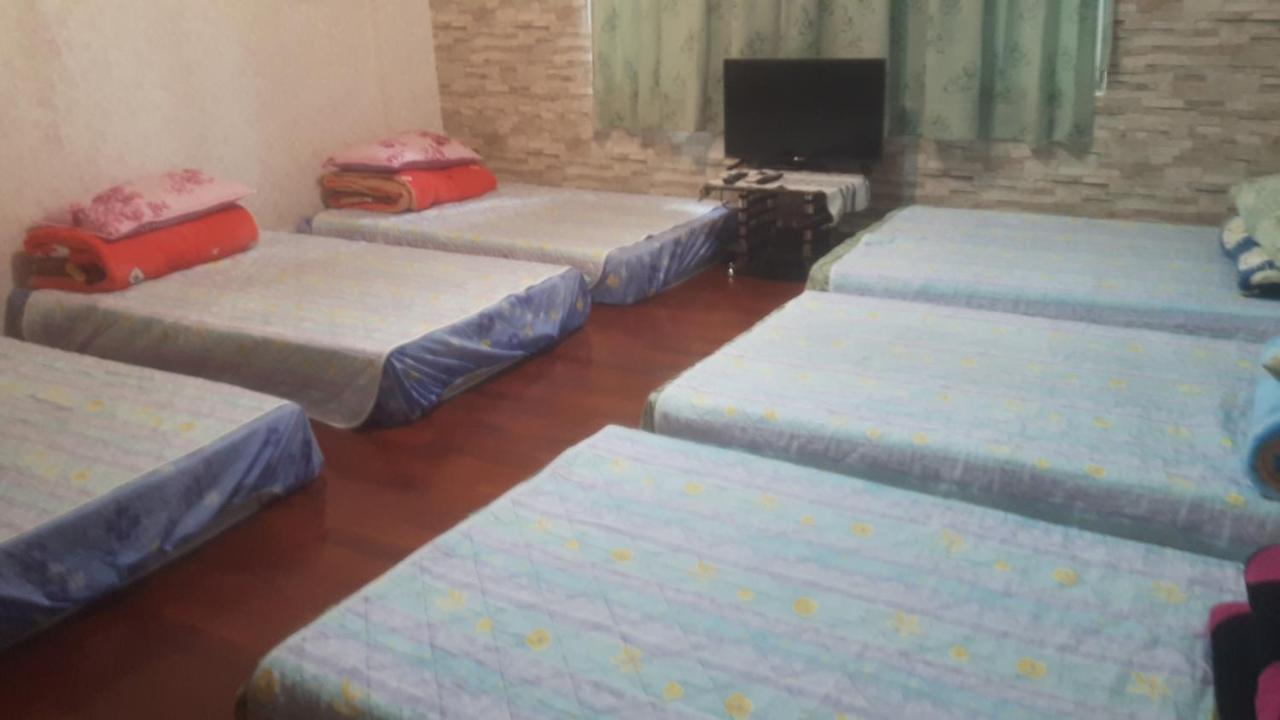 Cama en habitación compartida mixta de 10 camas